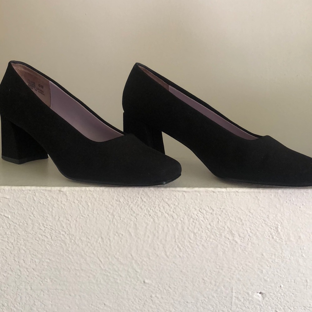 Black suede scuff marks on bottom of shoes